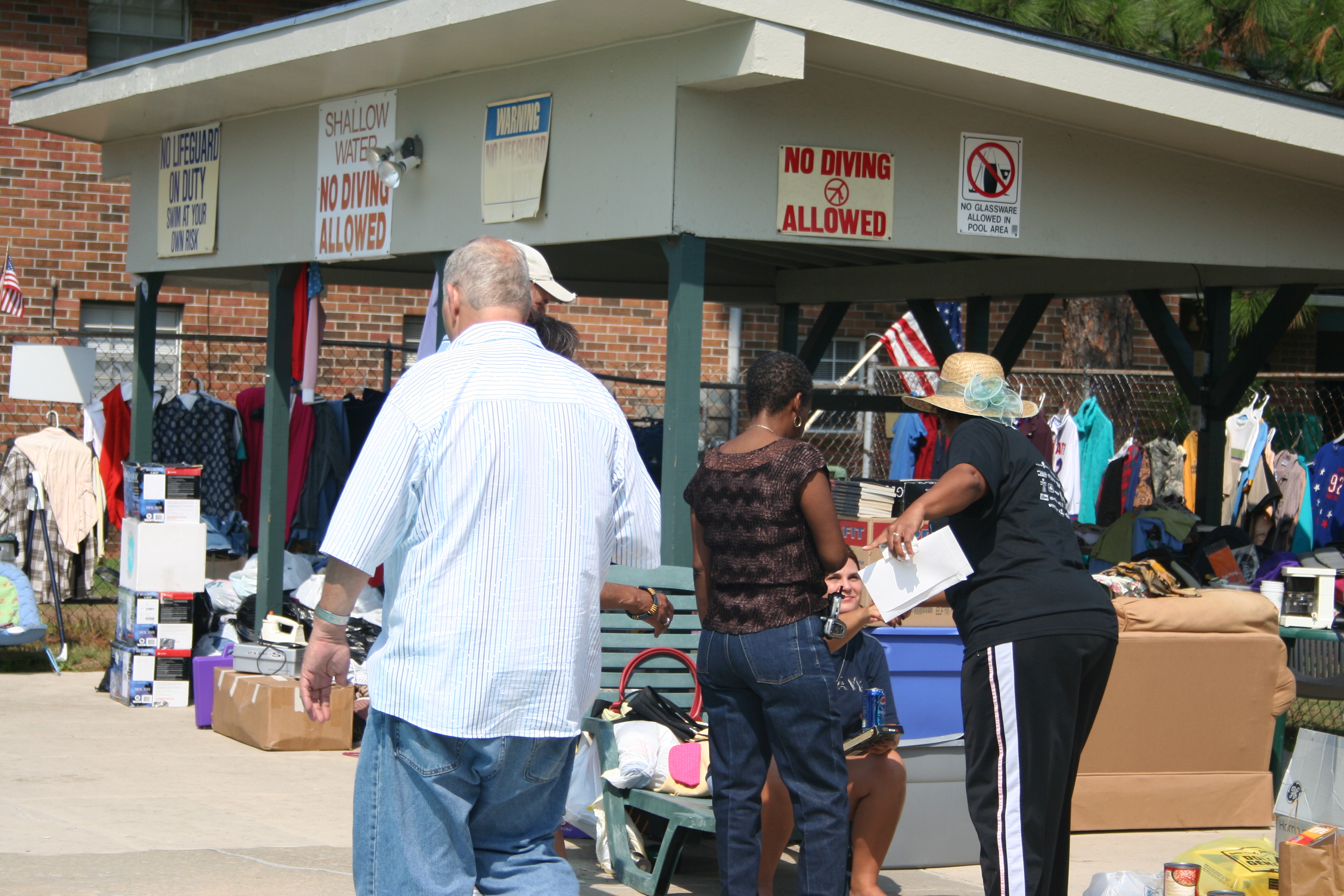 Displaced residents with supplies