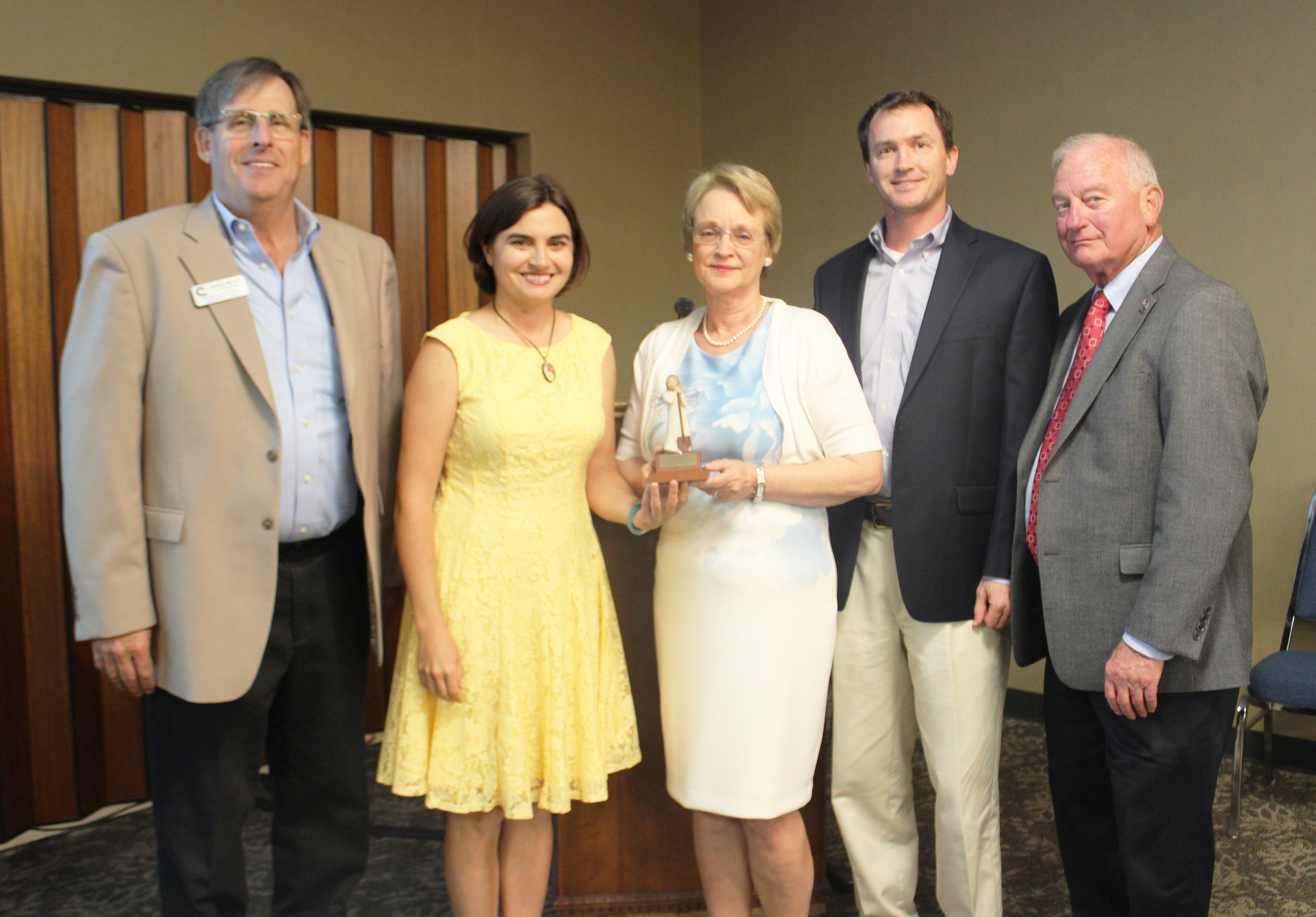 Associate Commissioner Mary Burts (center) was presented with the Volunteer of the Year Award at the Richland SWCD's Annual Banquet.