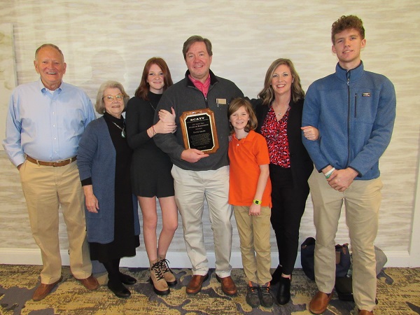 David Adams receiving award