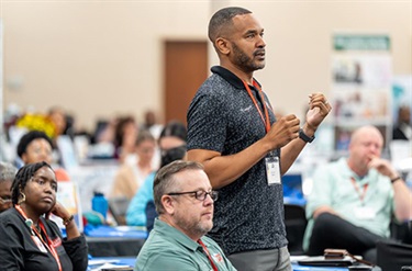 QA at Thrive 25 event