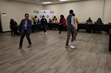 participants smiling at an OSBO networking event